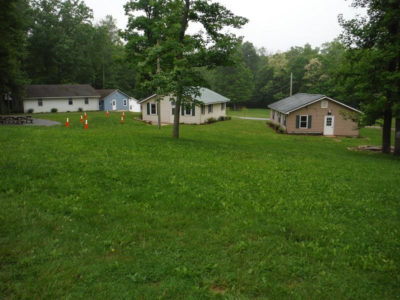 Cabins and lush lawn